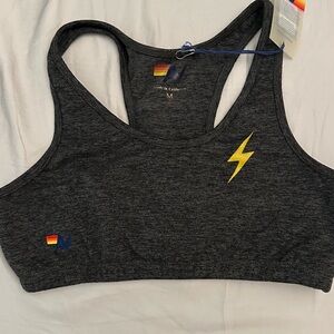 Aviator Nation Dark Gray Sports Bra with Yellow Lightning Bolt